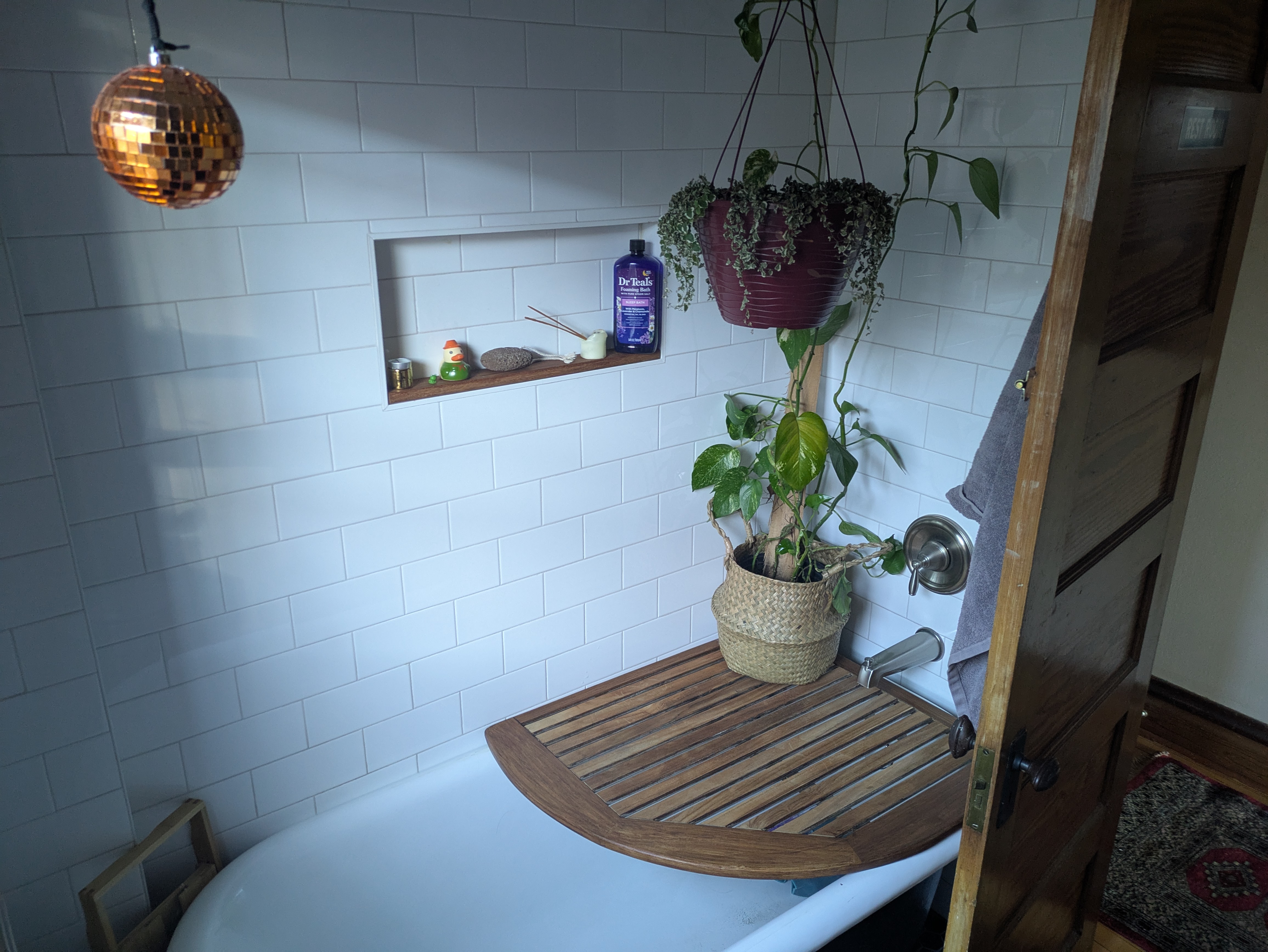 Bathroom with deep clawfoot bathtub